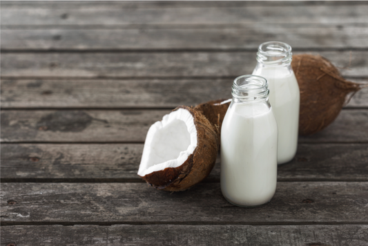 coconut and coconut kefir in a glass bottle
